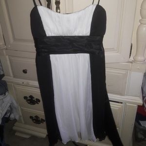 Flowy black and white dress w/ spaghetti straps.